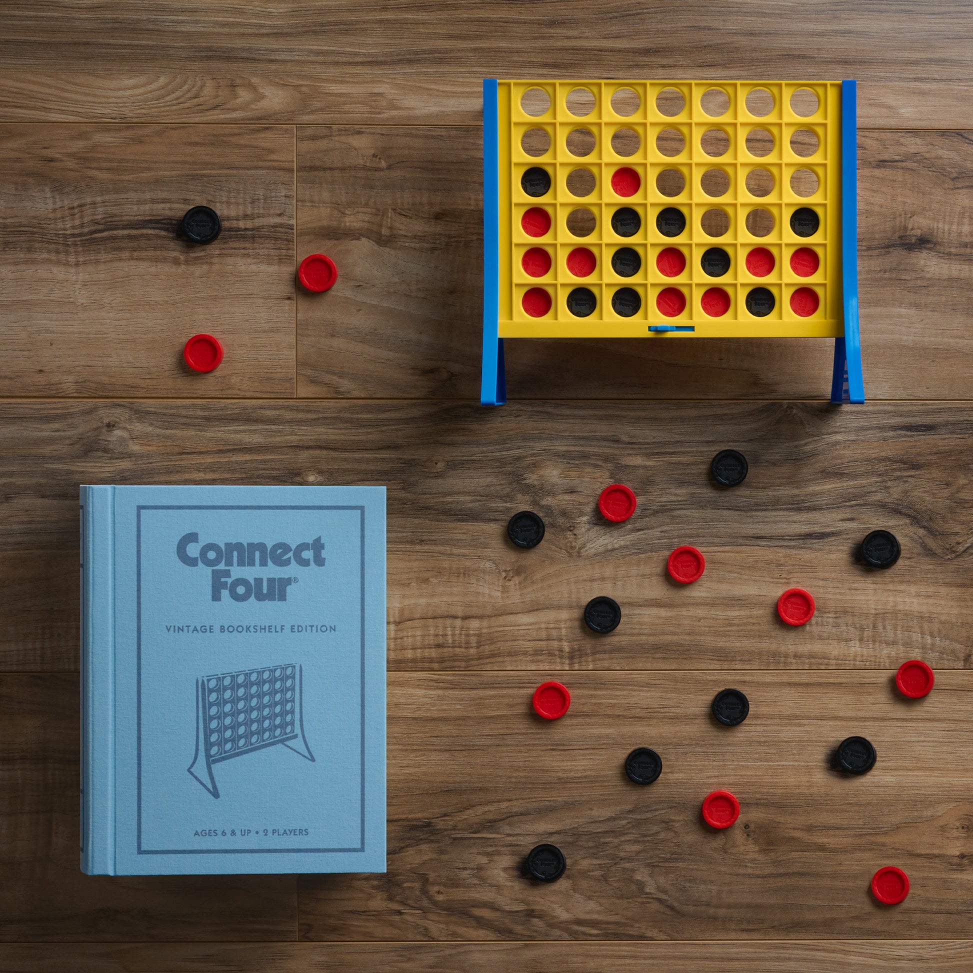 Connect4_juego_de_mesa_en_forma_de_libro_decorativo